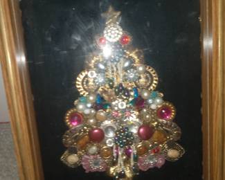 Christmas tree made of vintage jewelry framed