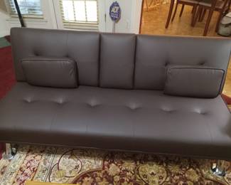 Brand New out of the box. We put it together & it has cupholders & lays flat.