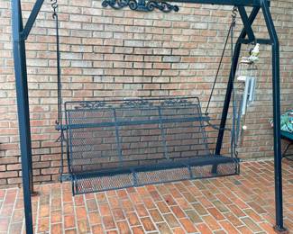 Swing with wrought iron stand
