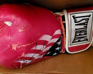 Autographed boxing gloves. By who that is the question.