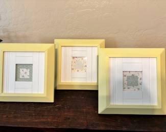 Yellow framed square prints 