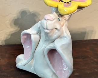 Cartoonish clay bunny figurine 