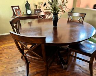 Round dining table with five chairs 