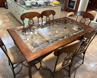Dining room table with iron accents