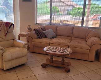 Nice American leather sofa and white leather lazy boy recliner plus nice oak tables and western art, lighting and decor!
