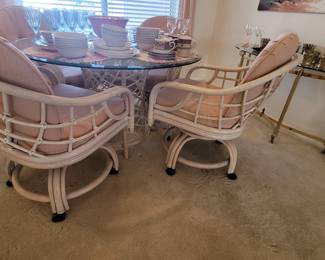 Postmodern coastal lane venture whitewash rattan dining set with 4 swivel caster chairs!