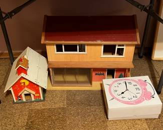 Doll house being sold with furniture, which is in the clock box