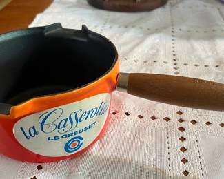 Brand new flame orange Le Creuset saucepan with double spouts