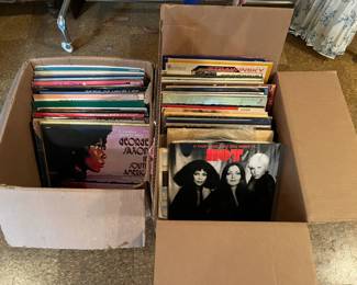Two boxes 33 records. Plus 2 small boxes of 45s in a bedroom in the basement