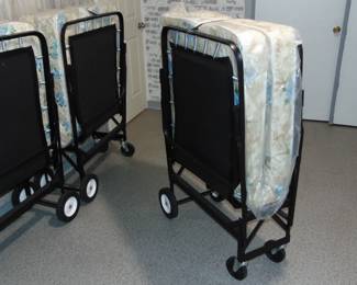 Rollaway cots still in the plastic
