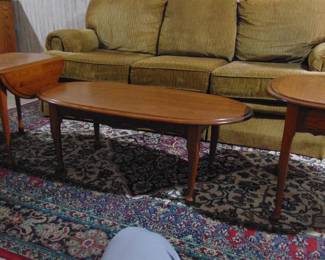 Solid Oak Coffee table and end tables, one has a drawer and one is drop leaf table