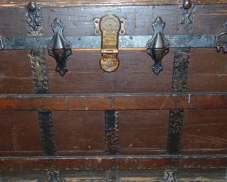 Antique trunk . Still has the handles in tact