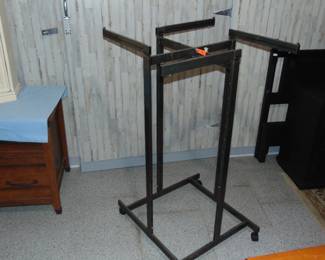 Adjustable commercial clothes rack, on wheels, adjust higher and the 4 arms pull out longer