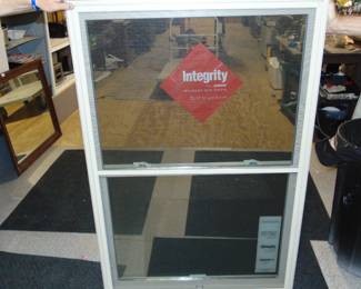 a different new replacement window, one is tan and one is white