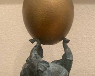 Bras, patina miniature, elephants holding up large gold ostrich egg