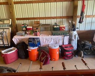 coolers, camping stuff, grill grates, golf clubs