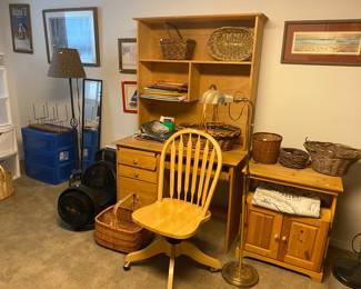 desk, chair, nice cabinet and fans a small amount of office supplies