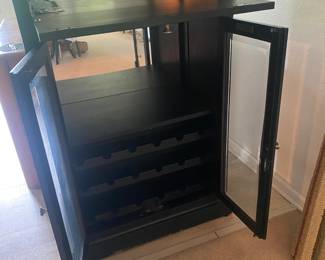 Liquor cabinet opened (mirrored backing)