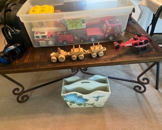 toys, wooden coffee table - very nice, magazine holder, nascar listening device