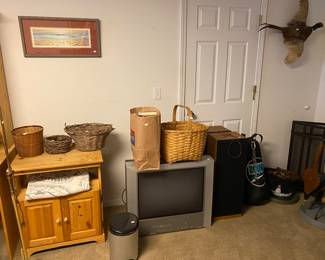 tube tv, VHS tapes, large speakers, punching bag, pheasant, etc
