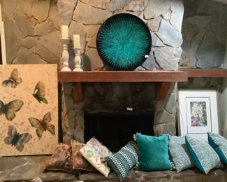 lots of Art work and Pillows Decor