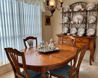 Universal 48" Round, Four Legged Table with 18" Leaf and 4 Wheat Back Chairs