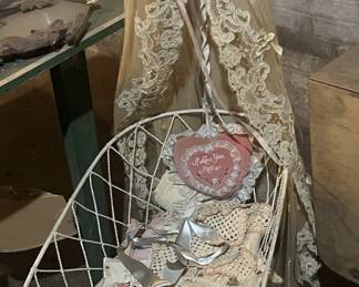 Miniature cradle with lace canopy