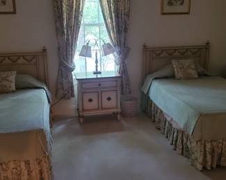 Pair of twin beds and nightstand