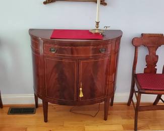 Demilune console cabinet and a pair of antique Birdseye maple chairs