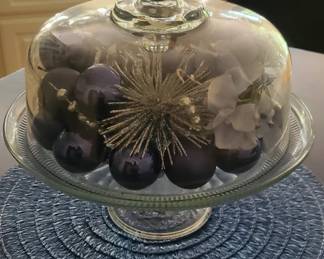 Cake plate full of blue ornaments 