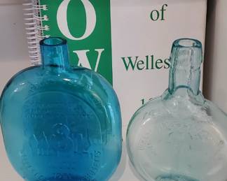 Women of Wellesley books and commemorative bottles