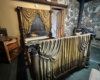 Incredible.......Bed for royalty 
They are early 20th-century fanciful creations. The bed is in an Italianate style, and the painting is not of any quality. It may have been commissioned by a wealthy person to meet their desire for opulent ornateness 