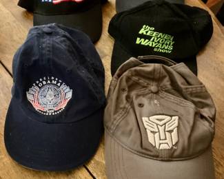 Obama & ‘Entertainment’ hats. 