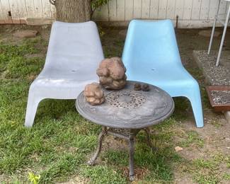 Outdoor chairs. Table.  4 Meditating Yogi Stone figures.