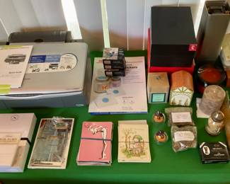 Epson printer.  Ink.  Candles. Incense.  Oil diffuser.  Beats boxes (empty).  Hummel cards.  Unique, funky, fun & risqué, postcards.