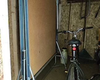 Folding ping pong table and bike (items sold separately).