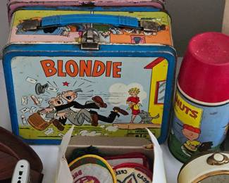 Vintage Lunch boxes, Peanuts thermos, Boy Scout patches and more (items sold separately).