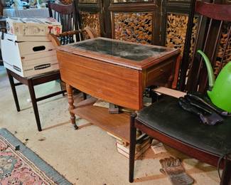 Drop leaf tea cart and other items (items sold separately).