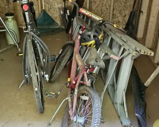 Bikes, ladder and garden tools (items sold separately).