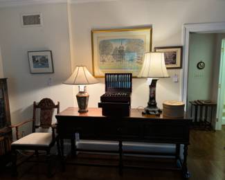 Many vintage lamps and silverware sets.