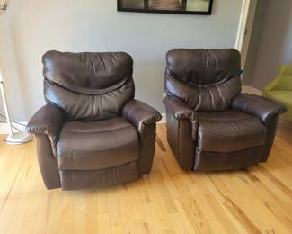 STATE OF THE ART -- TWO LA-Z-BOY ROCKING POWER LEATHER RECLINERS WITH POWER HEADREST AND BACK INFLATING SUPPORT AND ELECTRONIC CHARGING FOR YOUR PHONE/TABLET - $250 EACH