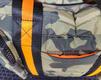 Woman's Handbags THINK ROYLN - The Highlander Duffel Bag w/ Trolly Sleeve- this bag is loaded with pockets and plenty of storage done in camo military green and bright orange/black accents. Description
Travel plans? If not, you'll definitely want to make them once you get your hands on this fab bag. With a convenient trolley sleeve and plenty of exterior pockets (and interior space!) this duffel bag keeps you organized (and looking so cute paired with your airport athleisure 'fit!). From Think Royln.
Style: The Highlander
Reversible strap, trolley sleeve, top zip entry, four zip pockets
Lined interior, zip pocket
Measures approximately 16" x 12.75" with a 52" strap; weighs 2.17 lbs
Shell 100% nylon; lining 100% polyesterOUR PRICE $40.00(list $99-$258 on ebay)
