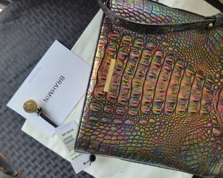 Melbourne Collection by BRAHMIN, the Katie Crossbody Bag features:
Leather, Zip-top closure, Gold-tone hardware, Interior organizer pockets, Pen pocket, Back slide-in pocket, Key clip  OUR PRICE IS $75....NWT $195.00, FYI list on ebay with wallet for $525