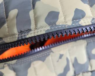 Woman's Handbags THINK ROYLN - The Highlander Duffel Bag w/ Trolly Sleeve- this bag is loaded with pockets and plenty of storage done in camo military green and bright orange/black accents. Description
Travel plans? If not, you'll definitely want to make them once you get your hands on this fab bag. With a convenient trolley sleeve and plenty of exterior pockets (and interior space!) this duffel bag keeps you organized (and looking so cute paired with your airport athleisure 'fit!). From Think Royln.
Style: The Highlander
Reversible strap, trolley sleeve, top zip entry, four zip pockets
Lined interior, zip pocket
Measures approximately 16" x 12.75" with a 52" strap; weighs 2.17 lbs
Shell 100% nylon; lining 100% polyesterOUR PRICE $40.00(list $99-$258 on ebay)