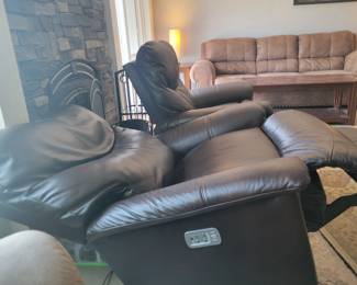 STATE OF THE ART -- TWO LA-Z-BOY ROCKING POWER LEATHER RECLINERS WITH POWER HEADREST AND BACK INFLATING SUPPORT AND ELECTRONIC CHARGING FOR YOUR PHONE/TABLET - $250 EACH