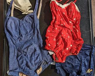 Some of the swim suits... The 40s Cole of California suit on the left is divine, featuring mesh fabric depicting anchors