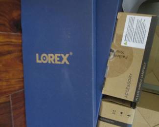 Lorex Security System: 7-Cameras, 8-Junction Boxes, 1-Monitor, & Mouse, 9-Rolls of Coil & Phone Cable. Monitored Through TV, Phone or Computer. Instructions Included!