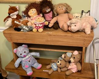 Vintage Cabbage Patch dolls, roller skates, pine benches