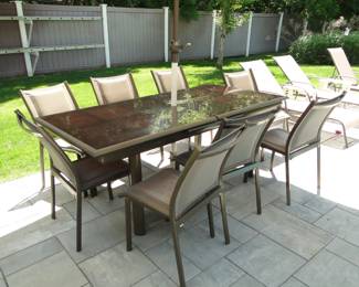Patio Table and 6 chairs (the lounge chairs are not for sale)