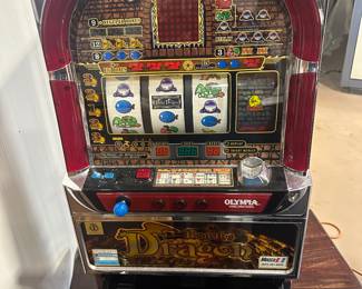 Excellent working dragon slot machine, uses quarters, $275 but it right now.